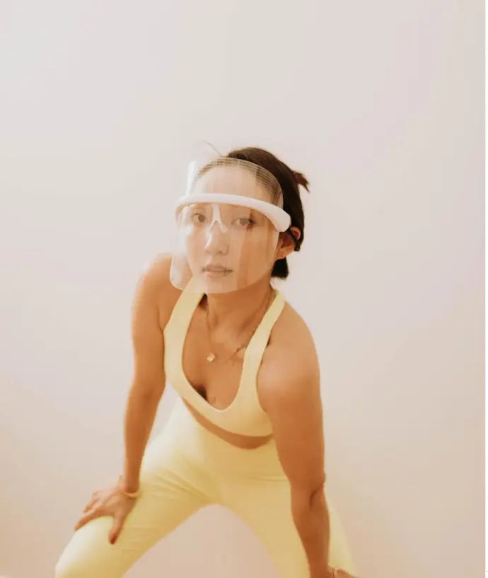 woman in sport clothes wearing Derma Therapy Mask