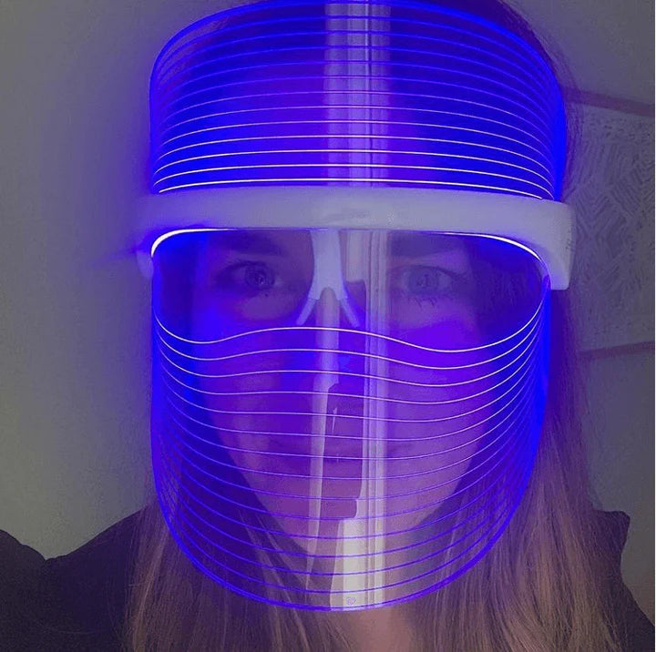 Woman trying bluelight therapy Derma Therapy Mask