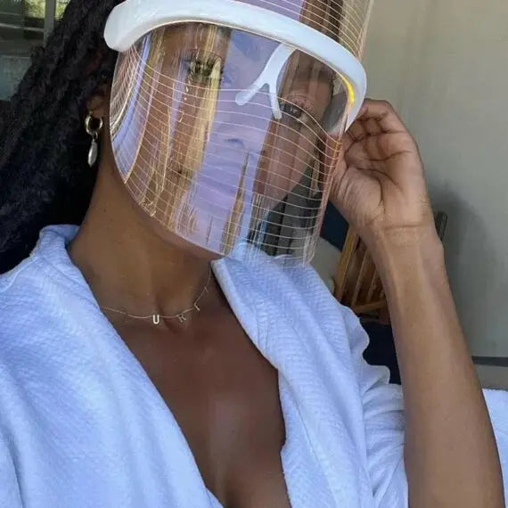 african woman using Derma Therapy Mask