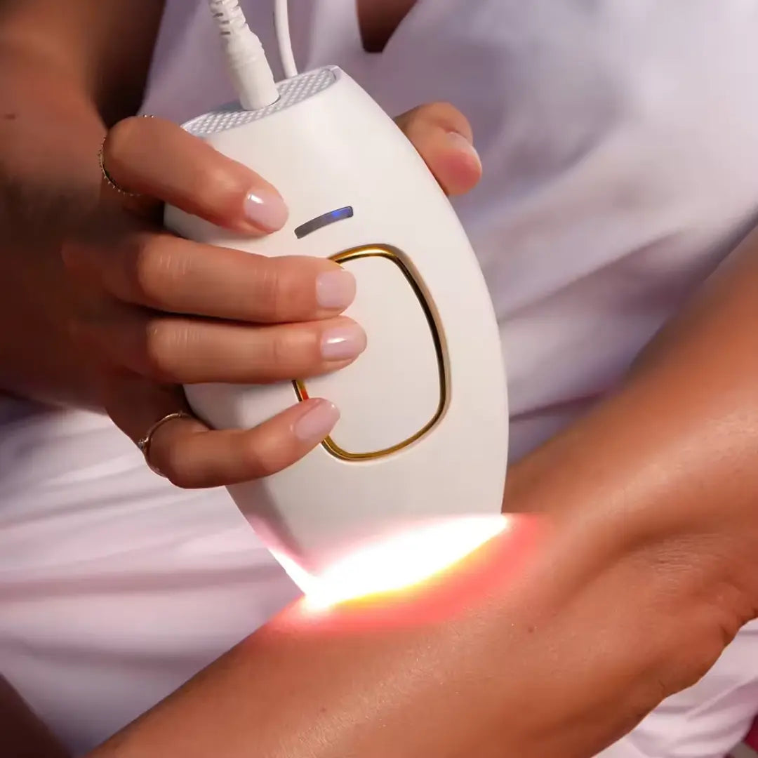White IPL Laser Hair Remover using on arm