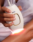 White IPL Laser Hair Remover using on arm