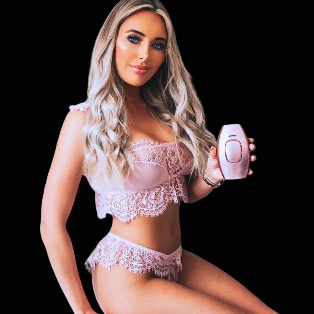Woman in pink holding IPL hair remover