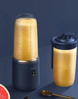 Portable mini blender with additional cup