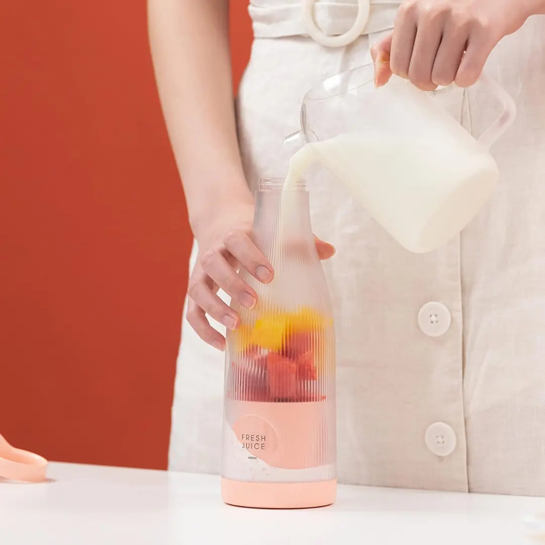 Making a smoothie with my Portable Burgundy Blender