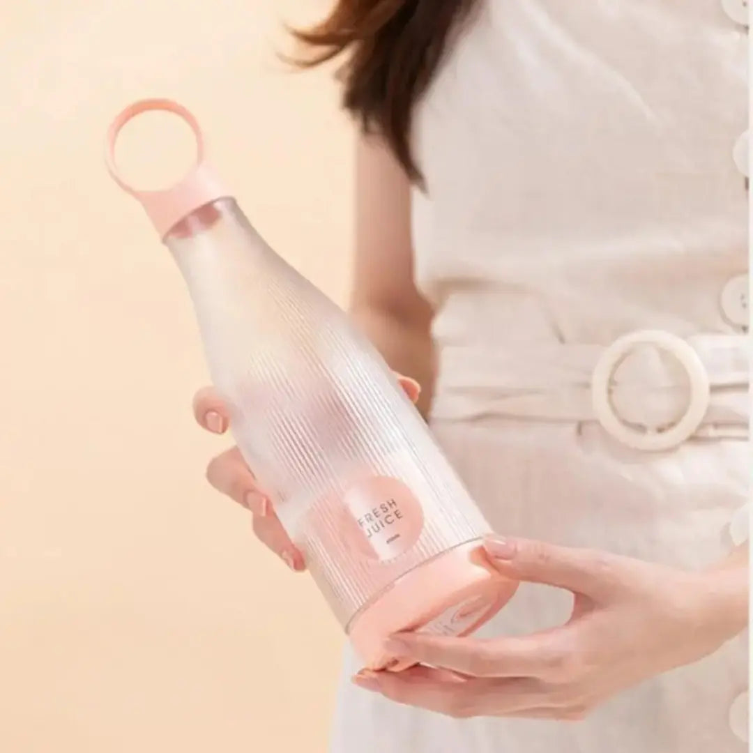 holding my portable blender