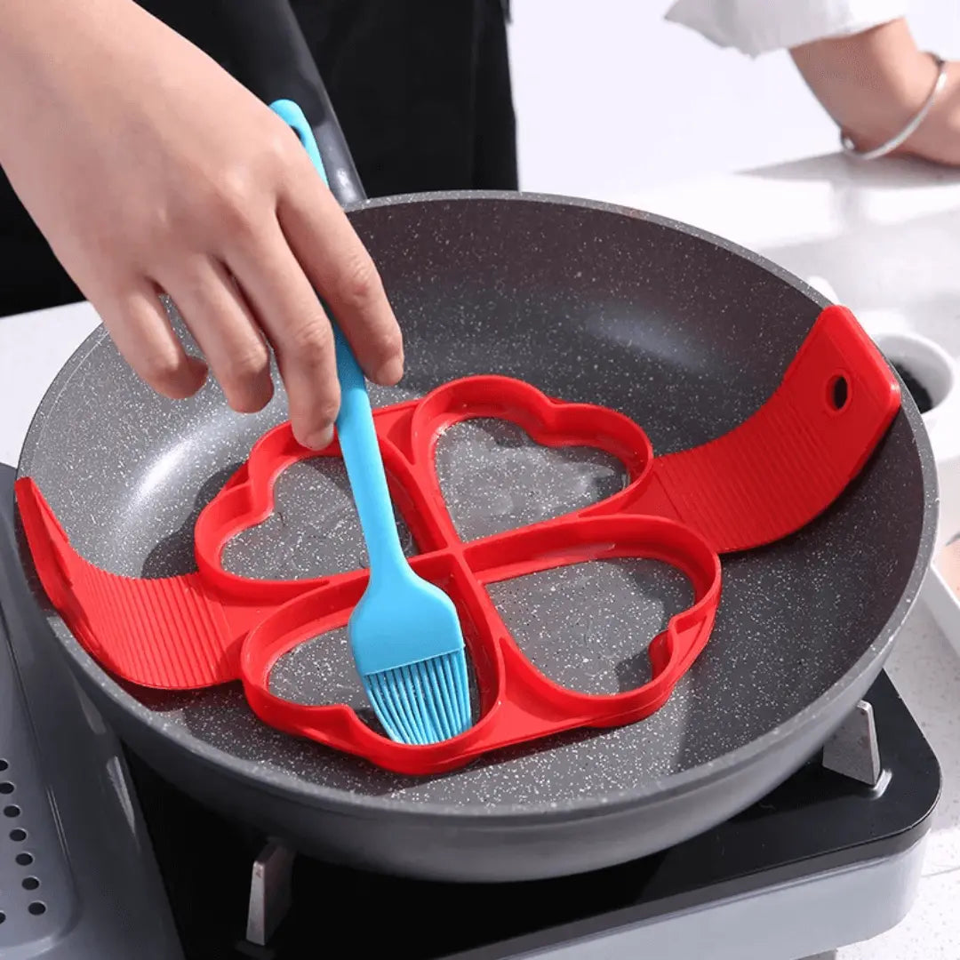 Pancake silicone mold hearts shape used in a pan