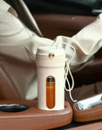 Portable Blender Pro Recharging in a car